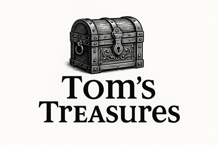 tom treasure website logo in black letters with a treasure chest logo